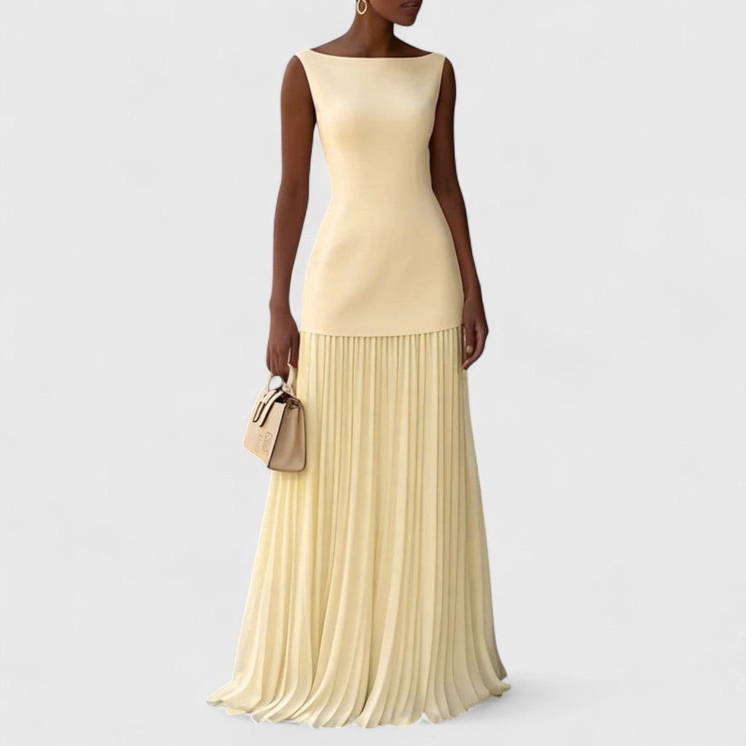 Αργυρώ - Μακρύ πλισέ φόρεμα με ρομαντική κίνηση και διαχρονική χάρη