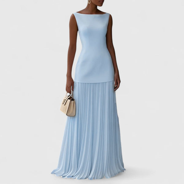 Αργυρώ - Μακρύ πλισέ φόρεμα με ρομαντική κίνηση και διαχρονική χάρη