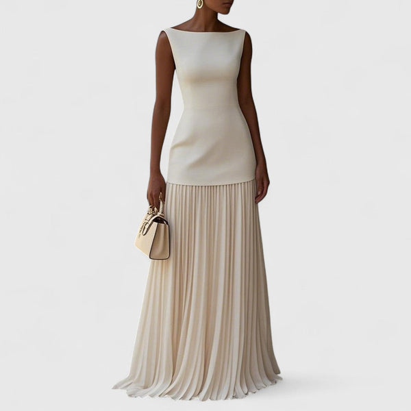 Αργυρώ - Μακρύ πλισέ φόρεμα με ρομαντική κίνηση και διαχρονική χάρη